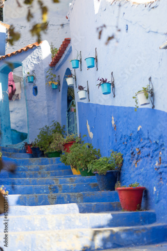 An ancient Arabic blue street in the city of Chefchaouen in Marocco during day unic specific blue pattern 