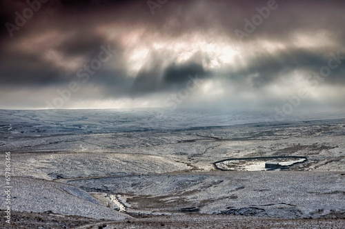 Cloudy Sky Over Snowy Landscape; Yorkshire Dales, England