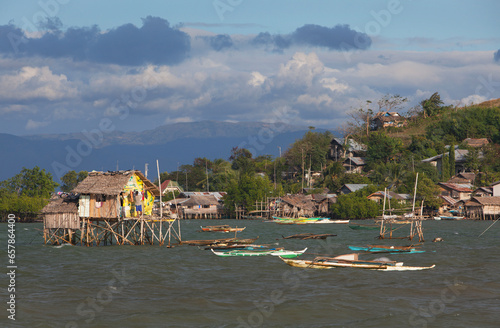 Stilt Houses Sit Above The Water; Bais, Negros, Philippines photo