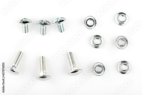 nuts and cogs isolated on white background. hex nut with slate close-up. screw with slate.