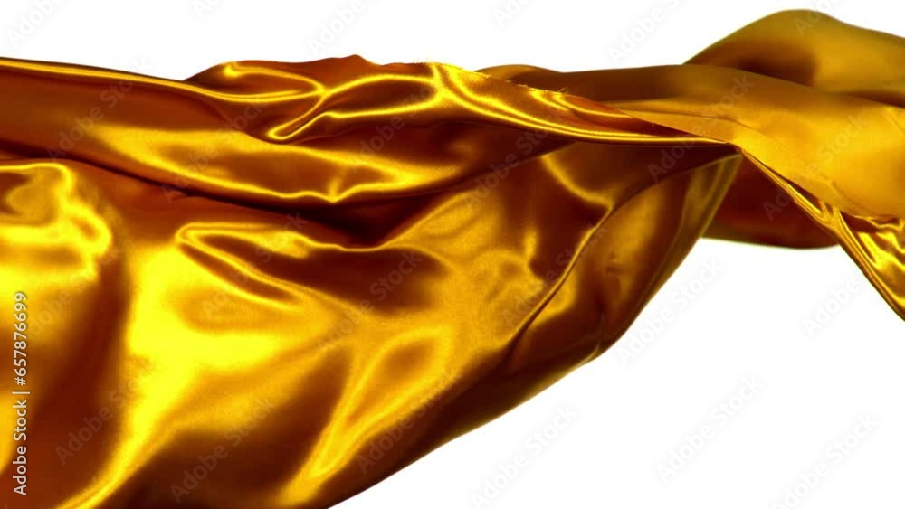 Super Slow Motion of Waving Golden Satin Cloth. Filmed on High Speed Cinema Camera, 1000 fps. Isolated on White Background. Super Slow Motion of Waving Golden Satin Cloth. Filmed on High Speed Cinema Camera, 1000 fps. Isolated on White Background.