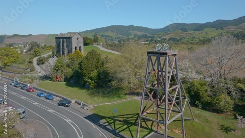 Old cornish Pumphouse and mining poppet in waihi, New Zealand