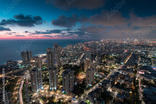 Bat Yam, Israel night areal view. City lights and seacoast © Алексей Голубев