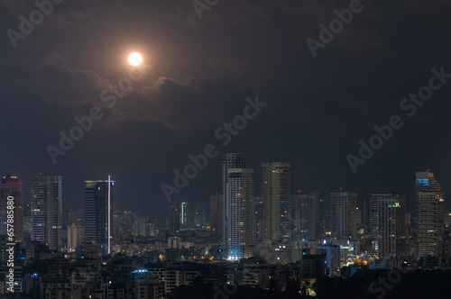 Full moon over night Tel Aviv