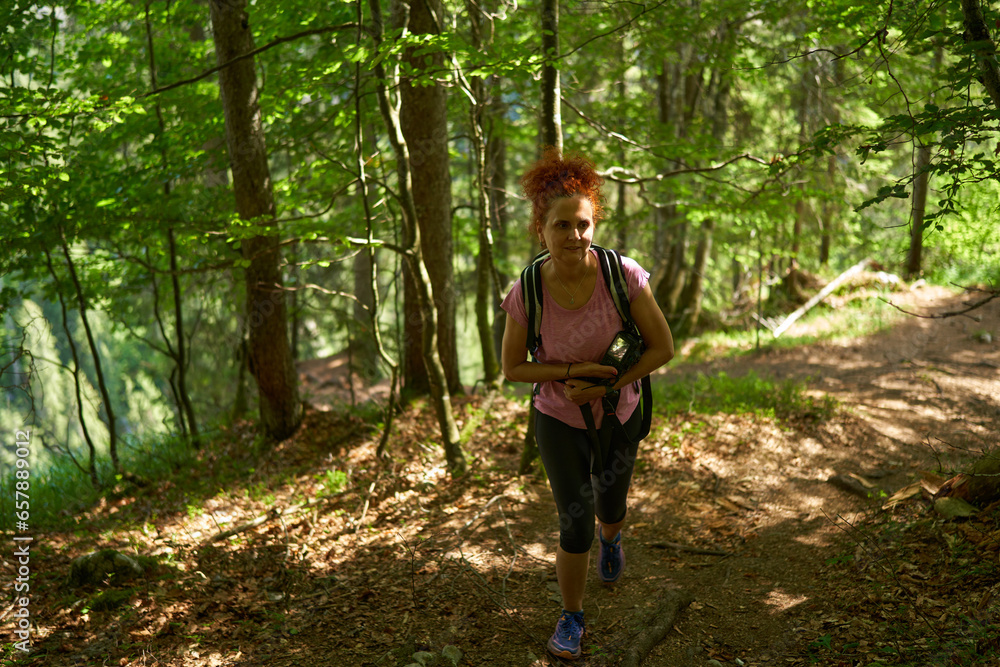 Hiker lady on the trail Hiker lady on the trail