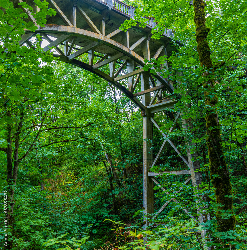 Historic Columbia River Gorge Highway Bridge Over The Latourell Falls Loop Trail at Guy W. Talbot State Park, Columbia River Gorge, Oregon, USA Historic Columbia River Gorge Highway Bridge Over The Latourell Falls Loop Trail at Guy W. Talbot State Park, Columbia River Gorge, Oregon, USA
