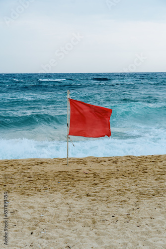 Red flag on a beach of Sarti  Greece