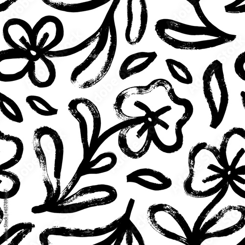 Brush-drawn daisies flowers seamless pattern. Bold flowers in naive or grunge style.