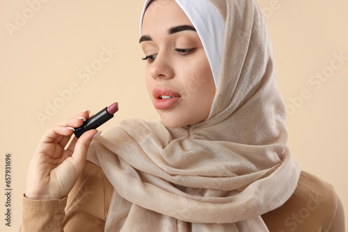 Young Muslim woman with lip...