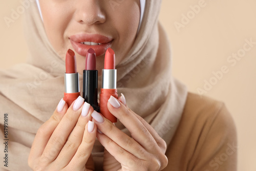 Young Muslim woman with lip...
