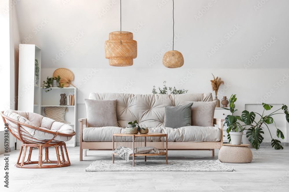 Obraz premium Interior of light living room with sofa, armchair and table
