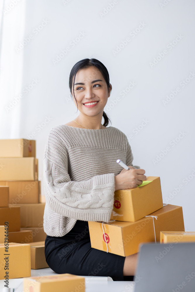 Startup happy Asian woman business owner works with a box at home, prepare parcel delivery SME supply chain, procurement, package box to deliver to customers, Online SME business entrepreneurs ideas,
Startup happy Asian woman business owner works with a box at home, prepare parcel delivery SME supply chain, procurement, package box to deliver to customers, Online SME business entrepreneurs ideas,
