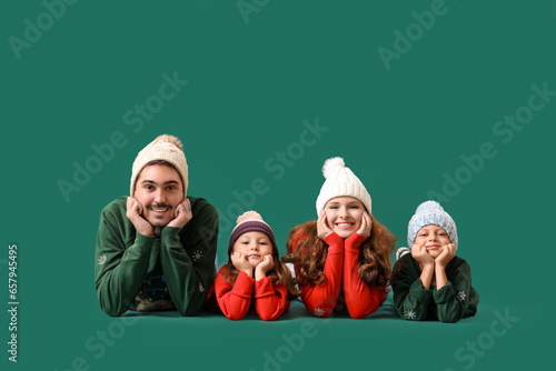 Happy family in warm sweate...