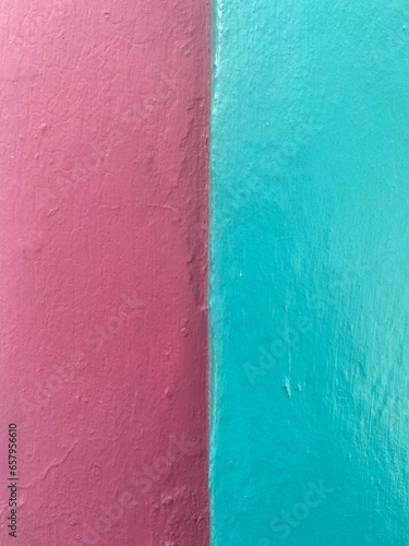 Bright colored textured painted wall in Oaxaca, Mexico