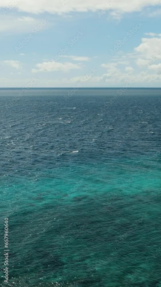 Beautiful motions of ocean waves under clear blue sky. Ocean skyline. Siquijor, Philippines. Beautiful motions of ocean waves under clear blue sky. Ocean skyline. Siquijor, Philippines.