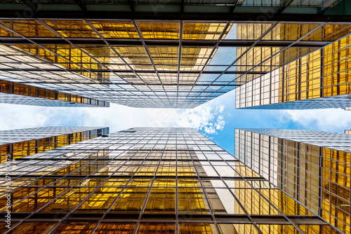 Low angle view of modern office buildings in HongKong photo