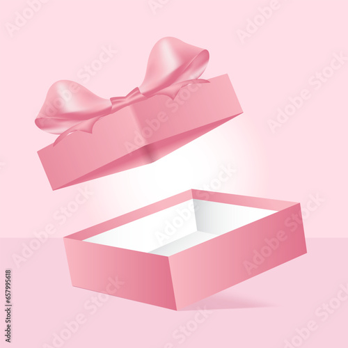 The pink box opens and the lid floats with a ribbon