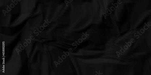 Crumpled black paper texture. Black crumpled paper texture crush paper. creased and wrinkled. Old dark black crumpled paper sheet background texture.	