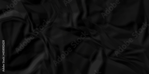 Crumpled black paper texture. Black crumpled paper texture crush paper. creased and wrinkled. Old dark black crumpled paper sheet background texture.	