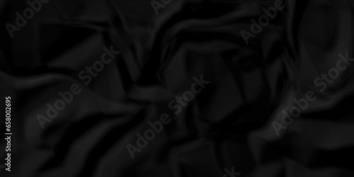 Crumpled black paper texture. Black crumpled paper texture crush paper. creased and wrinkled. Old dark black crumpled paper sheet background texture. 