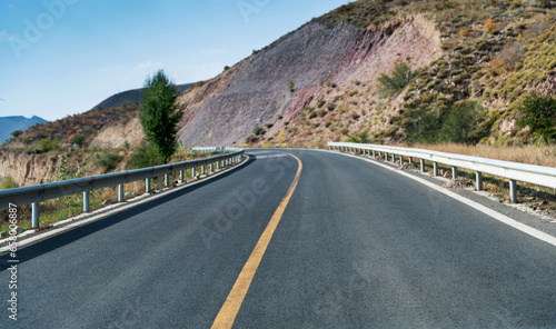 Curved asphalt road in mountains of Inner Mongolia, China