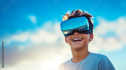 Boy enjoying VR under a blue sky