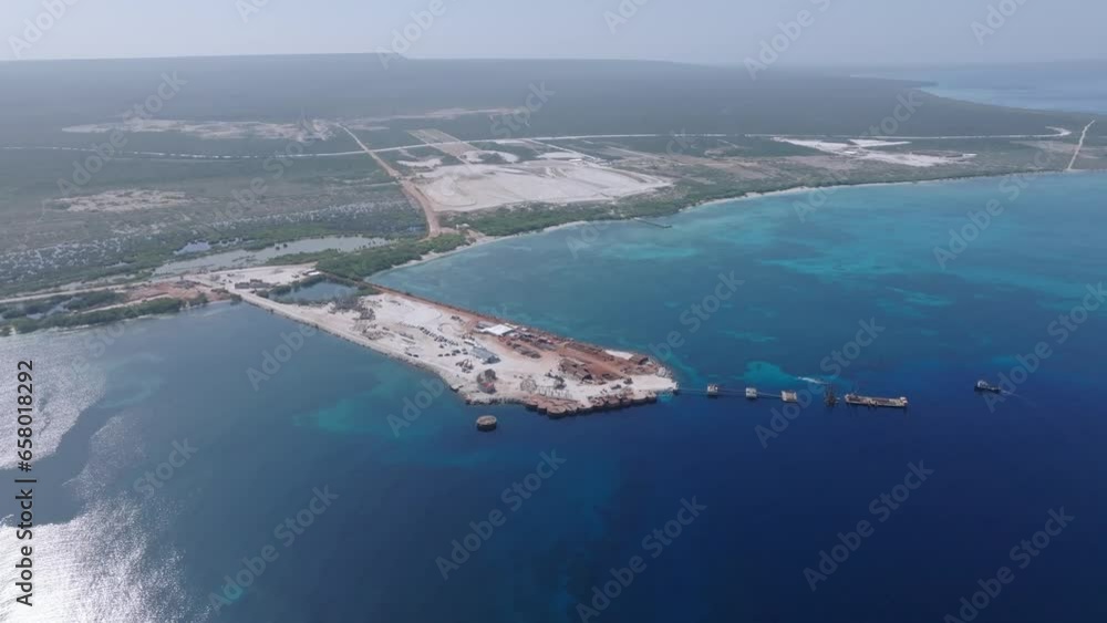 Aerial view circling the construction site of Puerto Cabo Rojo-Pedernales cruise port, in sunny Dominican Republic Aerial view circling the construction site of Puerto Cabo Rojo-Pedernales cruise port, in sunny Dominican Republic