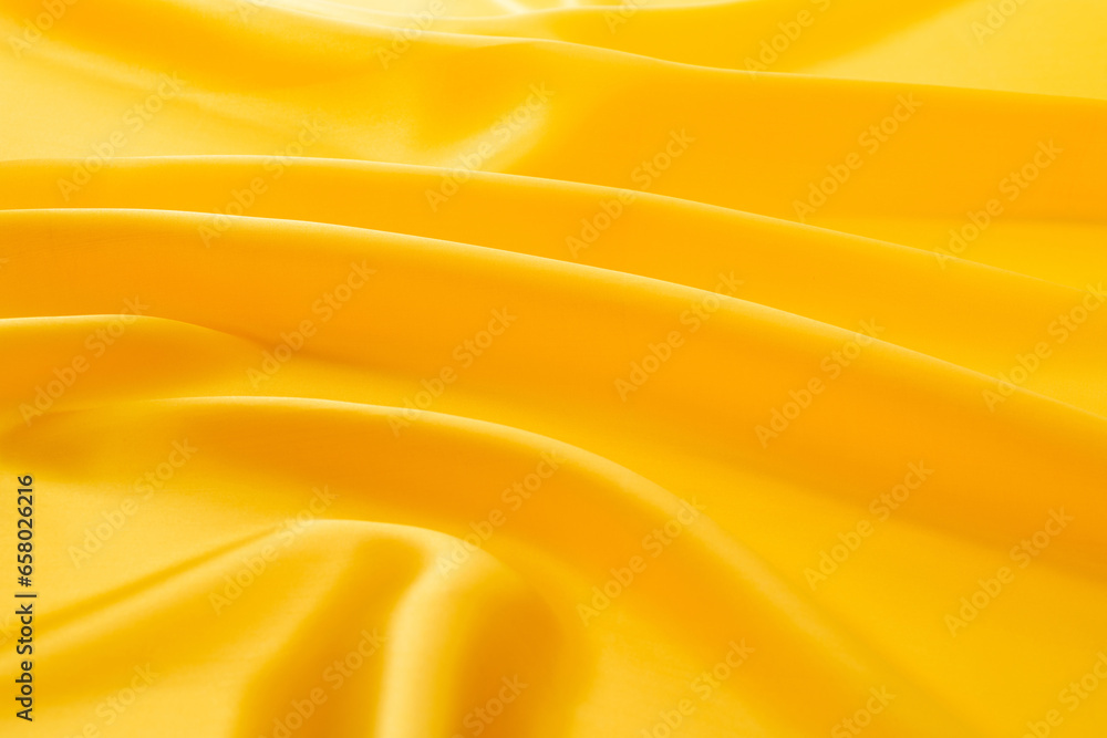 Close up of yellow silk background Close up of yellow silk background