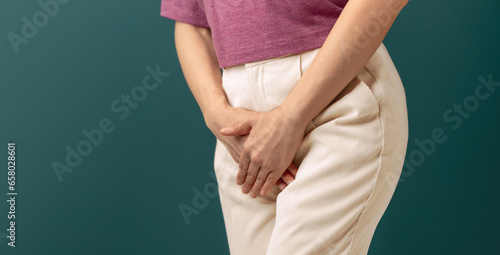 Photos Women using Hands to Cover the Itchy area between their legs