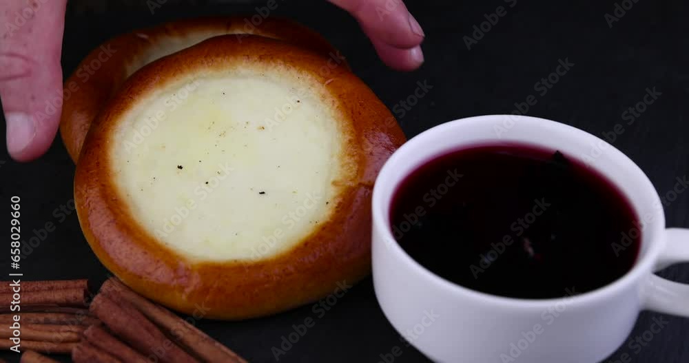 a bun with sour cream filling and cinnamon, a delicious and fresh bun with a creamy filling a bun with sour cream filling and cinnamon, a delicious and fresh bun with a creamy filling