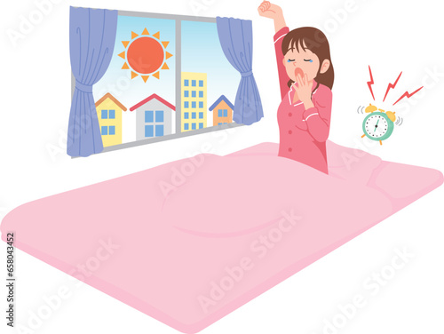起床　あくび　若い女性　布団