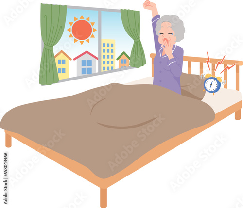 起床　あくび　高齢女性　ベッド