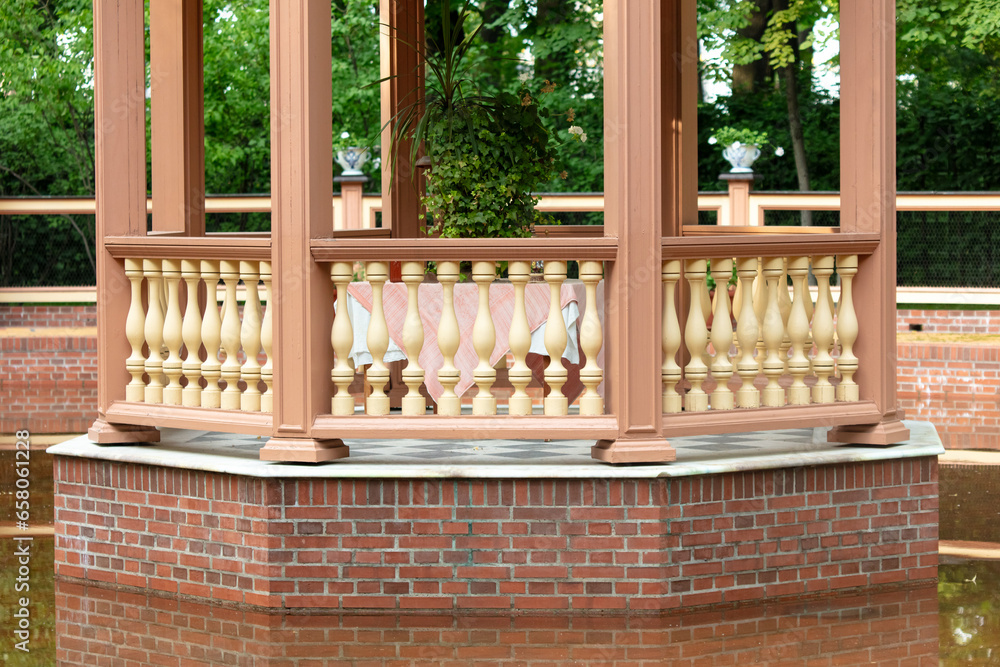 Balcony on the lake in an old-style park