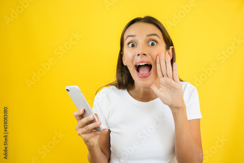 Surprised Woman Looking at Smartphone Earn Money Online Concept