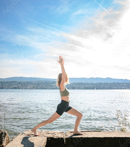 yoga on the beach, woman doing exercise, meditating