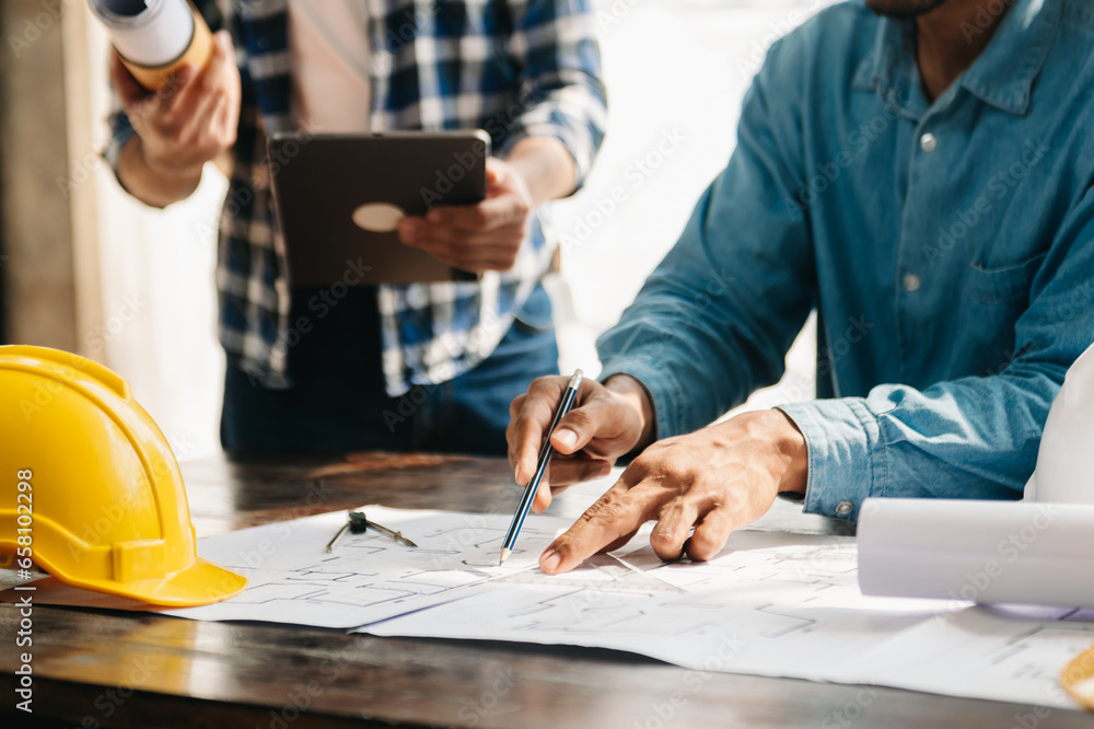 Engineer teams meeting working together wear worker helmets hardhat on ...