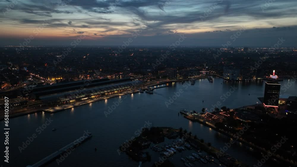 Aerial drone view of the skyline of Amsterdam central station. The Netehrlands. Aerial drone view of the skyline of Amsterdam central station. The Netehrlands.