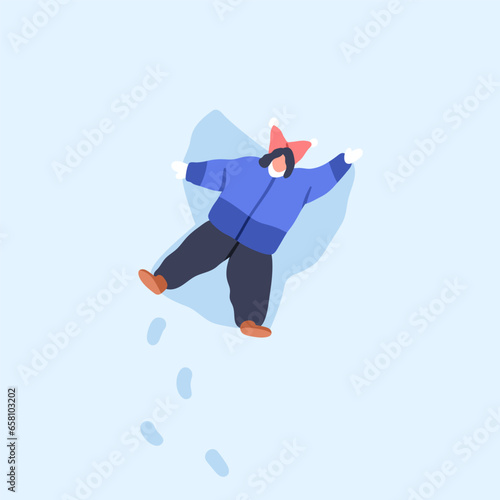 Kid making snow angel, lying in snowdrift, top view. Child with snowy wings, ...