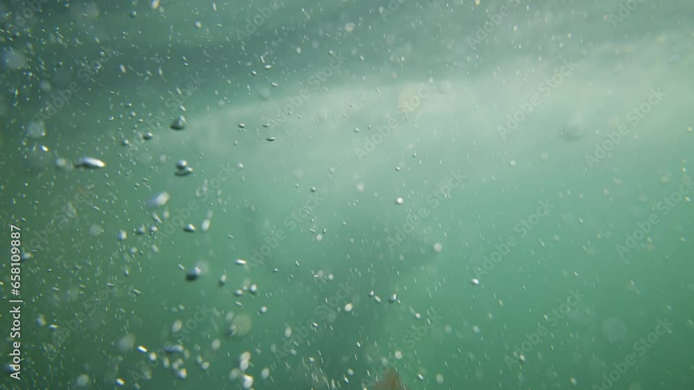 Underwater Bubbles with diver in background Underwater Bubbles with diver in background