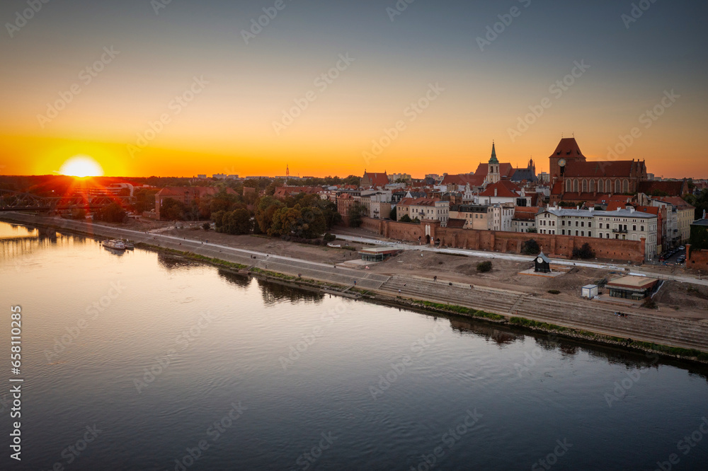 Wisla river by the Torun city at sunset, Poland.