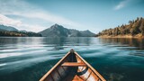 canoe in the middle of the lake mountains