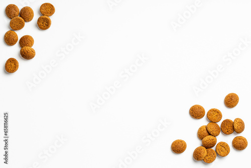 Dutch holiday Sinterklaas background with copy space for text. Kruidnoten cookies. Concept for children party Saint Nicolas day five december in the Netherlands. Top view, overhead.