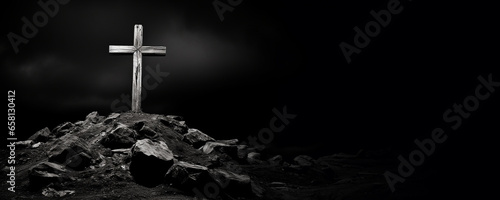 Photographie Religious Christian banner of a black and white wooden cross on rock hilltop wit