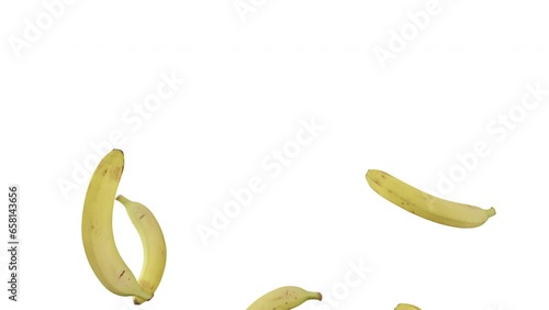 Bananas falling in slow motion on a white background