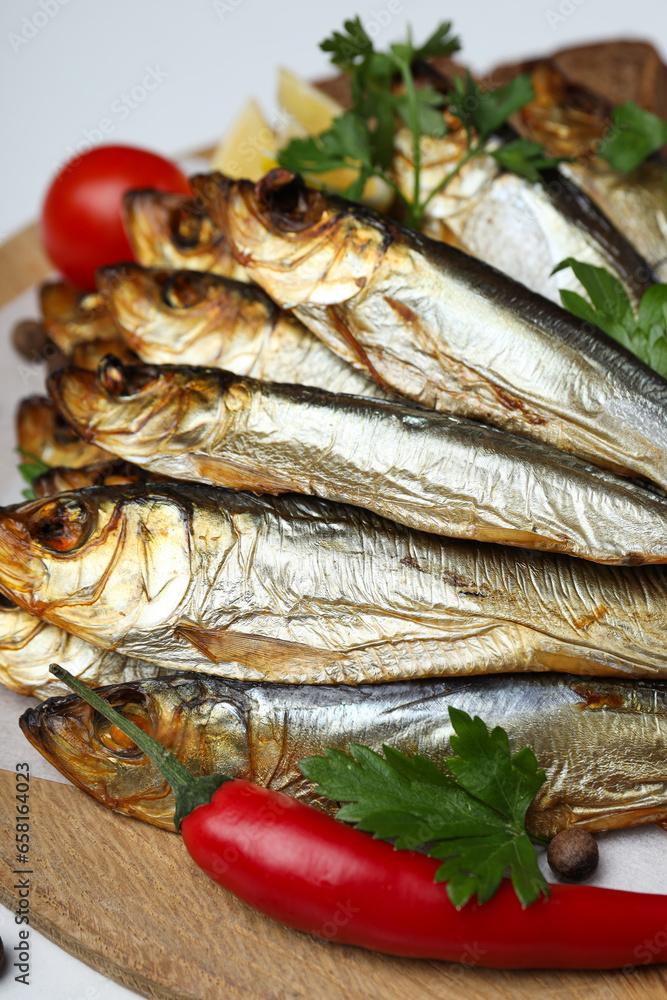 Concept of tasty food - delicious smoked fish Concept of tasty food - delicious smoked fish
