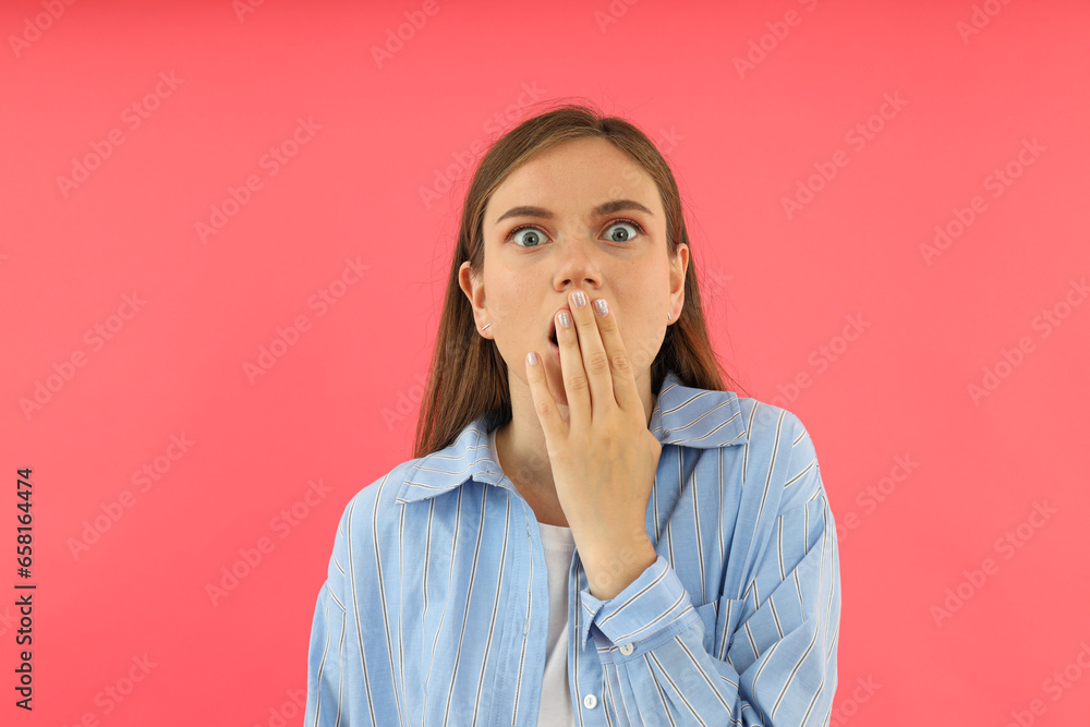 Beautiful emotional girl on a pink background. Beautiful emotional girl on a pink background.
