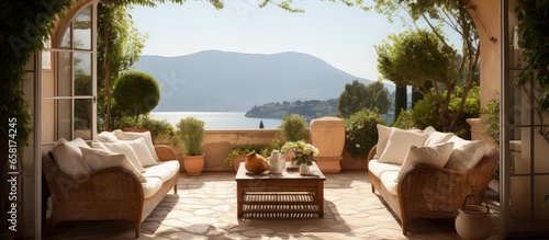 Mediterranean villa patio with wicker seating on the French Riviera
