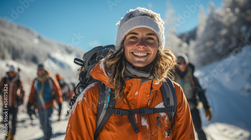 Photo of a girl skiing with friends in a sunny during the winter season