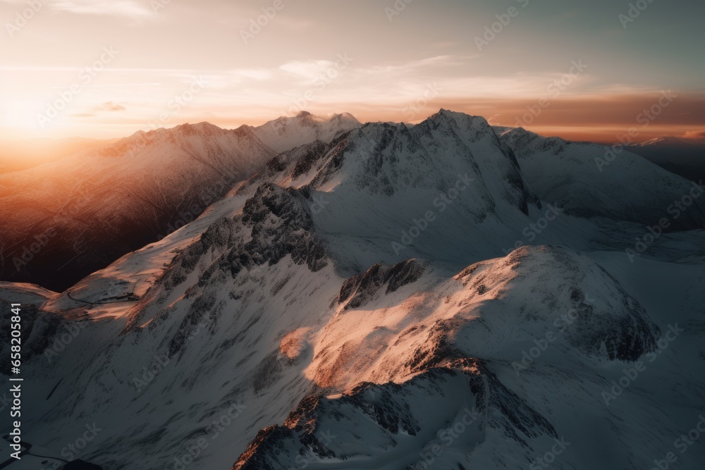A breathtaking drone shot of a snow-covered mountain range