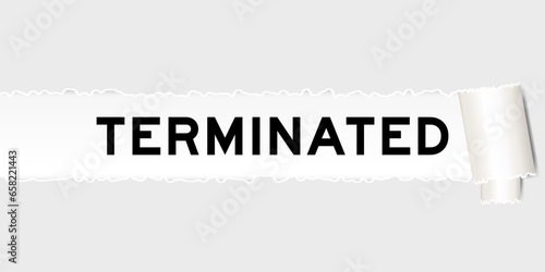 Ripped gray paper background that have word terminated under torn part